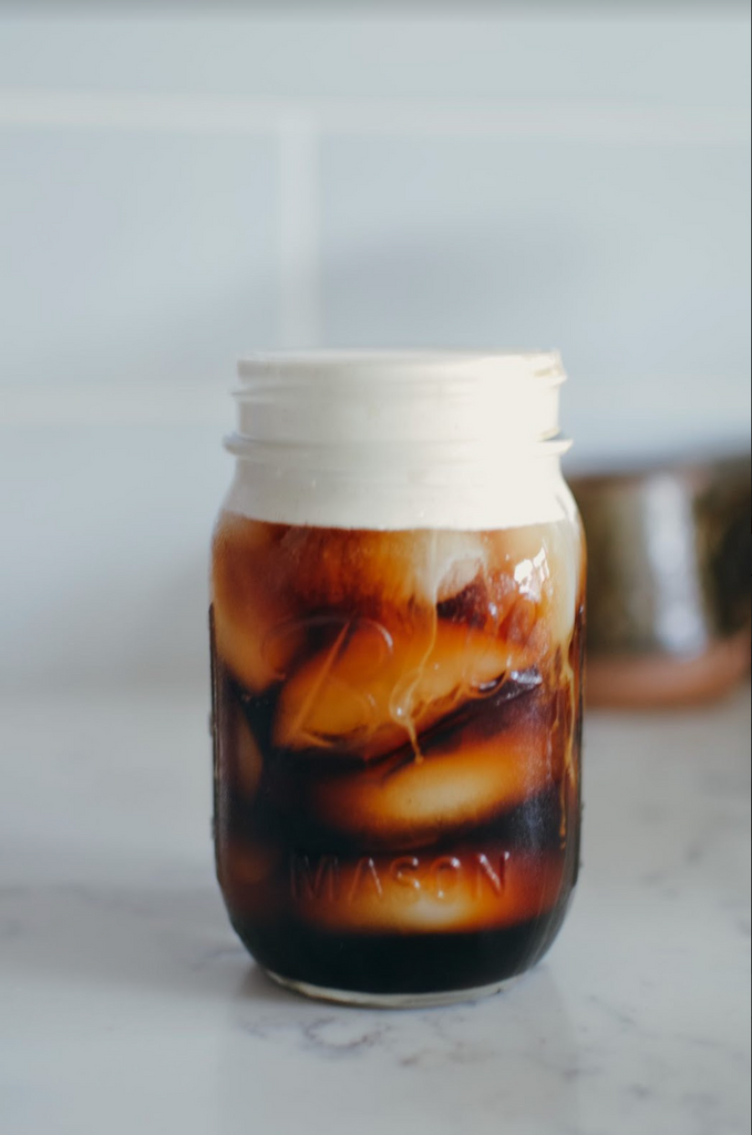 How to Make a Maple Whipped Cream Cold Foam Cold Brew at Home. Cold Brew with foam in mason jar. 