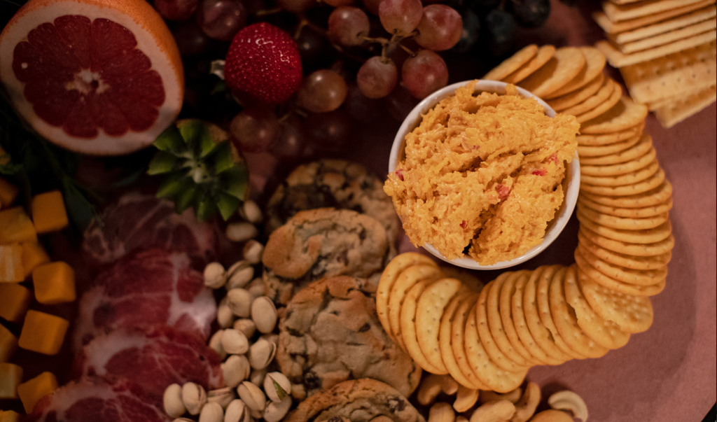 Athetik Bham event grazing table charcuterie pimento cheese and crackers