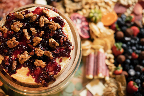 berries and candied pecans baked brie