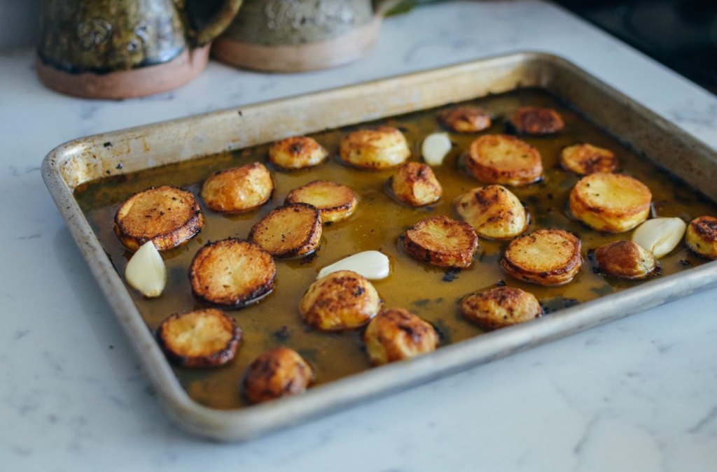 rosemary garlic melting potatoes recipe roasted potatoes in vegetable stock and garlic cloves
